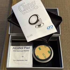 Magnetic Rotating Cell Phone Stand - Black and Silver